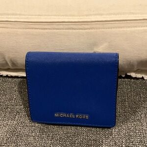 Michael Kors Royal Blue medium bifold wallet. Silver hardware. NWOT. No callouts